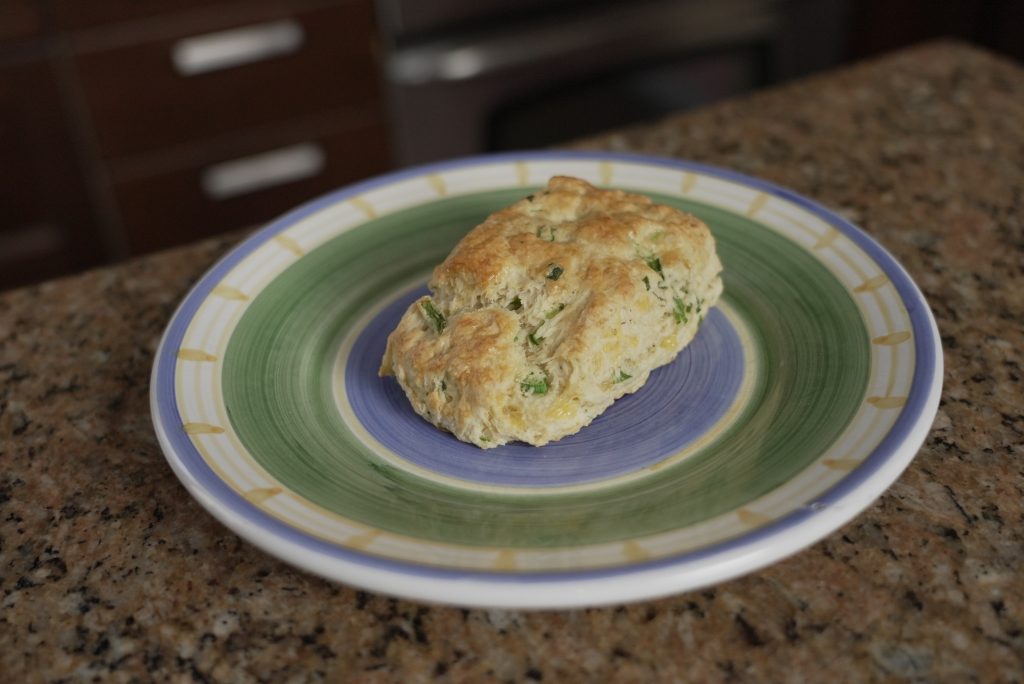 Buttermilk Cheddar and Chive Biscuit on plate