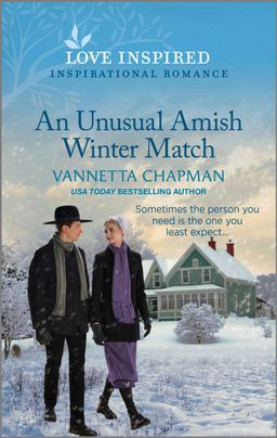 Cover image for An Unusual Amish Winter Match by Vannetta Chapman featuring an amish man and woman walking in front of a house covered in snow.