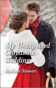 Cover for My Unexpected Christmas Wedding by Rachael Stewart, featuring a man and a woman hugging each other while outside in the snow. The man is wearing a black coat with a red scarft, and the woman is wearing a white coat and a red dress.