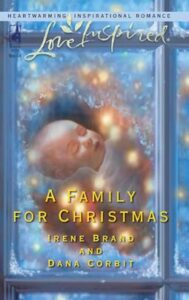 Cover image for A Family for Christmas by Irene Brand, Dana Corbit, featuring an image looking into a snowy window at a baby wrapped in a blanket surrounded by Christmas lights
