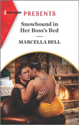 Cover image for Snowbound in Her Boss's Bed by Marcella Bell, featuring a woman sitting in a man's lap. The woman's back is towards us. The woman is in a cocktail dress and is wearing an ornate necklace. The man is in a suit. Behind them is a lit fireplace with a menorah lit on the mantle above.