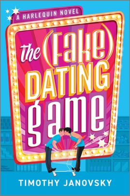 Cover image for The (Fake) Dating Game by Timothy Janovsky, featuring an illustration of two men on either side of a grocery cart kissing. Both are dressed in blue, with the one on the left wearing a t-shirt and the one on the right dressed in a tank top. The book title is illustrated in large block lettering surrounded by lights and stars.

