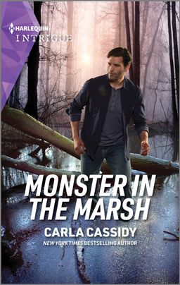 Cover image for Monster in the Marsh by Carla Cassidy, featuring a man walking through dark marsh water. There are logs and trees in the background. 
