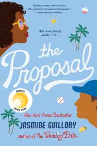 Cover image for The Proposal by Jasmine Guillory, which features the illustration of a man and a woman's faces over a blue background. The woman is wearing sunglasses and the man is wearing a baseball bat. There are also illustrations of baseballs, palm trees, tacos, and cupcakes on the cover background.