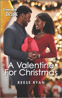 Cover image for A Valentine for Christmas by Reese Ryan, featuring a man and a woman. The man is in a suit and the woman is in a red dress. The man is handing the woman a red heart shaped gift box.