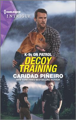 Cover image for Decoy Training by Caridad Piñeiro, featuring a police woman and a man on a road surrounded by trees at night. Above there is an image of the same man with a K9