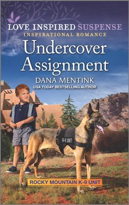 Cover image for Undercover Assignment by Dana Mentink, featuring a little boy and a K9 dog wearing a police vest. They are outside and there are mountains in the background.