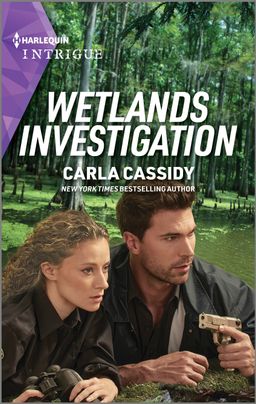 Cover image for Wetlands Investigation by Carla Cassidy, featuring a man and a woman crouching behind a log in the forest. The man is holding a gun. Both are looking into the distance, concerned.
