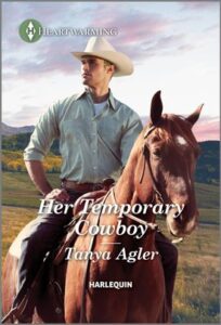 Cover image for Her Temporary Cowboy by Tanya Agler, featuring a cowboy on horseback looking off into the distance. There is a field and hills behind him. 