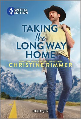 Cover image for Taking the Long Way Home by Christine Rimmer, featuring a cowboy walking down a road. He is wearing a cowboy had and is holding a jacket over his shoulder. There are mountains in the background.