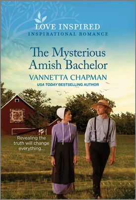 Cover image for The Mysterious Amish Bachelor by Vannetta Chapman, featuring a man and a woman in Amish attire walking away from a barn.
