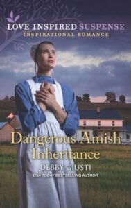 Cover image for Dangerous Amish Inheritance by Debby Giusti, featuring a woman dressed in an amish dress and bonnet, staring off into the distance with concern on her face. There is a large white house behind her.
