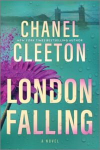 Cover image for London Falling by Chanel Cleeton, featuring an image of London Bridge in the background with a large purple flower in the foreground. There is a blue filter over the image.