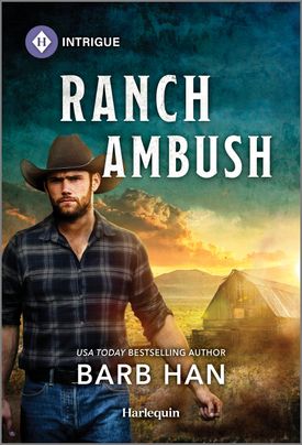 Cover image for Ranch Ambush by Barb Han, featuring a man in a cowboy hat walking away from a cabin. The sun is rising in the background.
