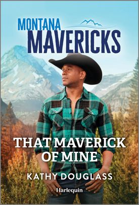 Cover image for THAT MAVERICK OF MINE by Kathy Douglass, featuring a cowboy standing outdoors with his hands in his pockets. There is a mountain range in the background.