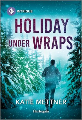 Cover image for HOLIDAY UNDER WRAPS by Katie Mettner, featuring a man running through the woods in the winter.