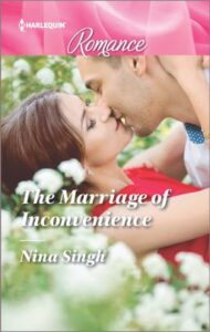 Cover image for The Marriage of Inconvenience by Nina Singh, featuring a man and a woman laying in a field of flowers, kissing.